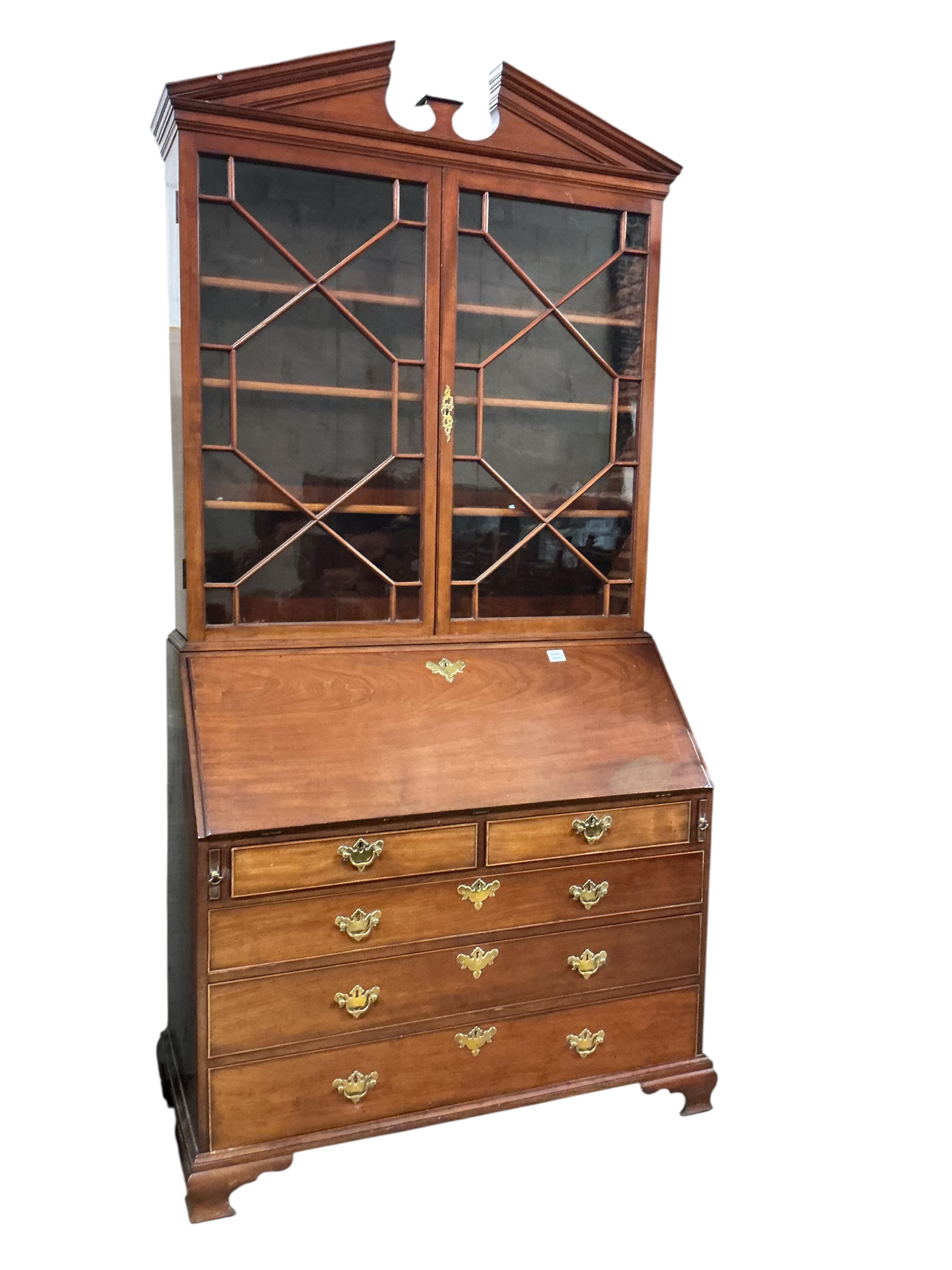 A George III style mahogany bureau bookcase, width 116cm, depth 55cm, height 224cm